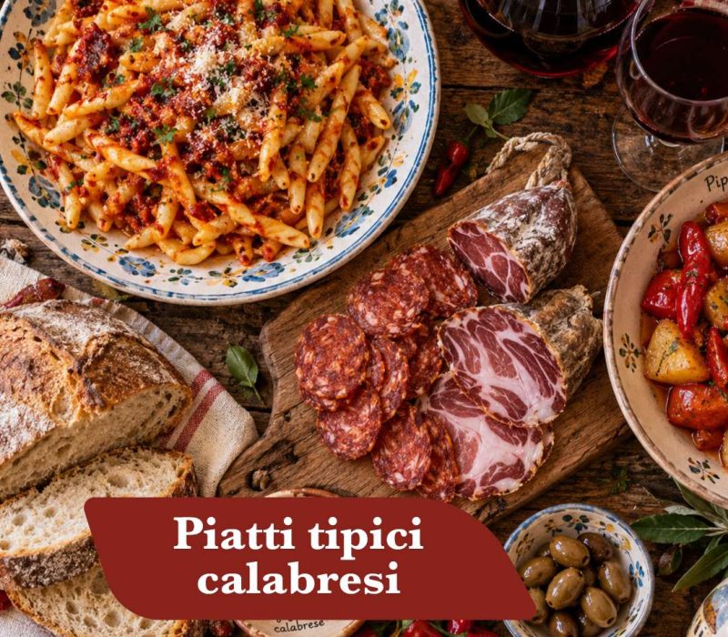 Piatti tipici calabresi: pasta con ’nduja, salumi, peperoncini e vino rosso